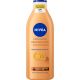 Nivea Q10 Reafirmante + Autobronceadora Body Lotion Loción corporal reafirmante y autobronceadora aspecto natural para tono de piel claro o medio 400 ml