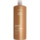 Wella Professionals Ultimate Smooth Shampoo Step 1 Champú nutritivo y suavizante para cabello encrespado 1000 ml